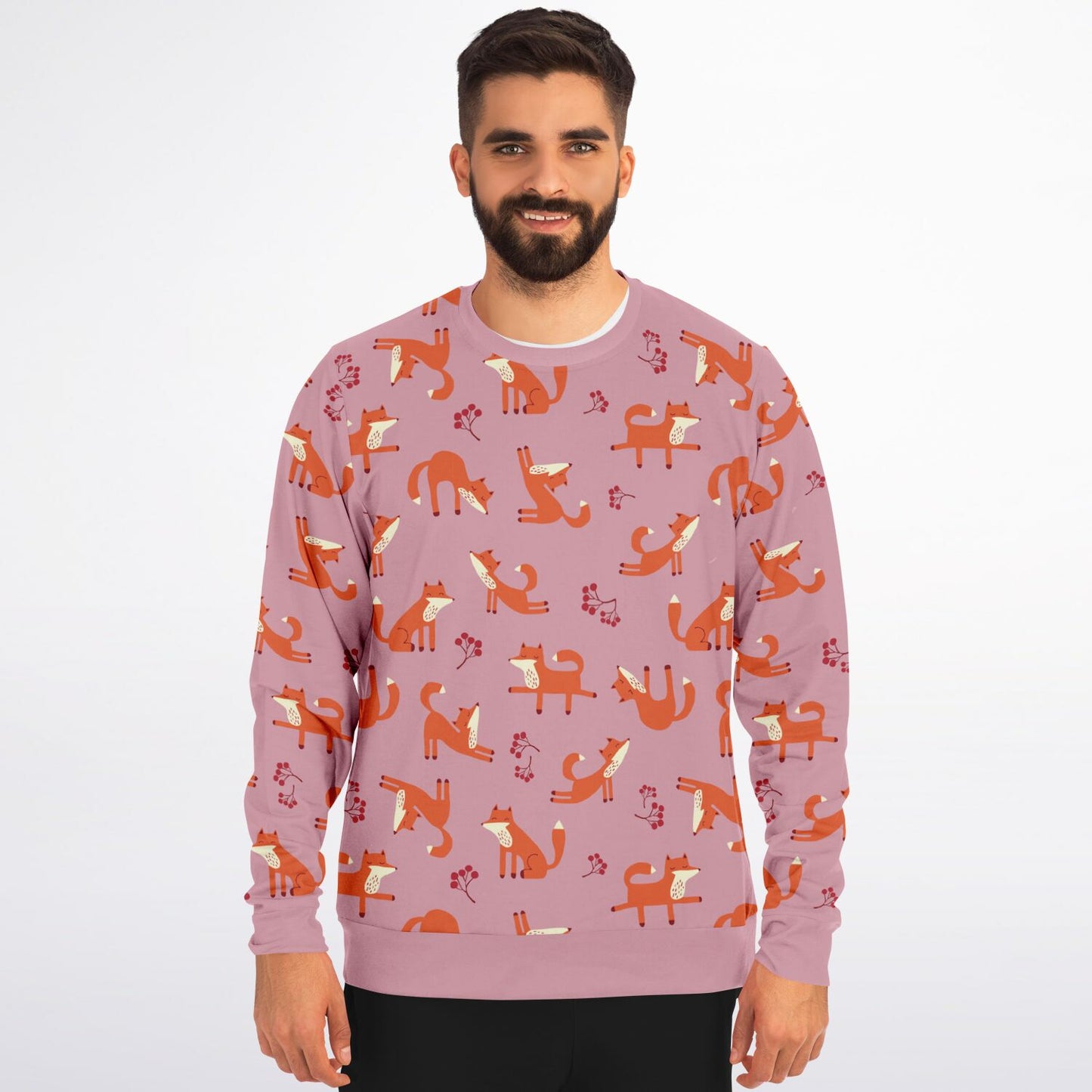 A man wearing a pink unisex sweatshirt with Playful Fox -pattern.