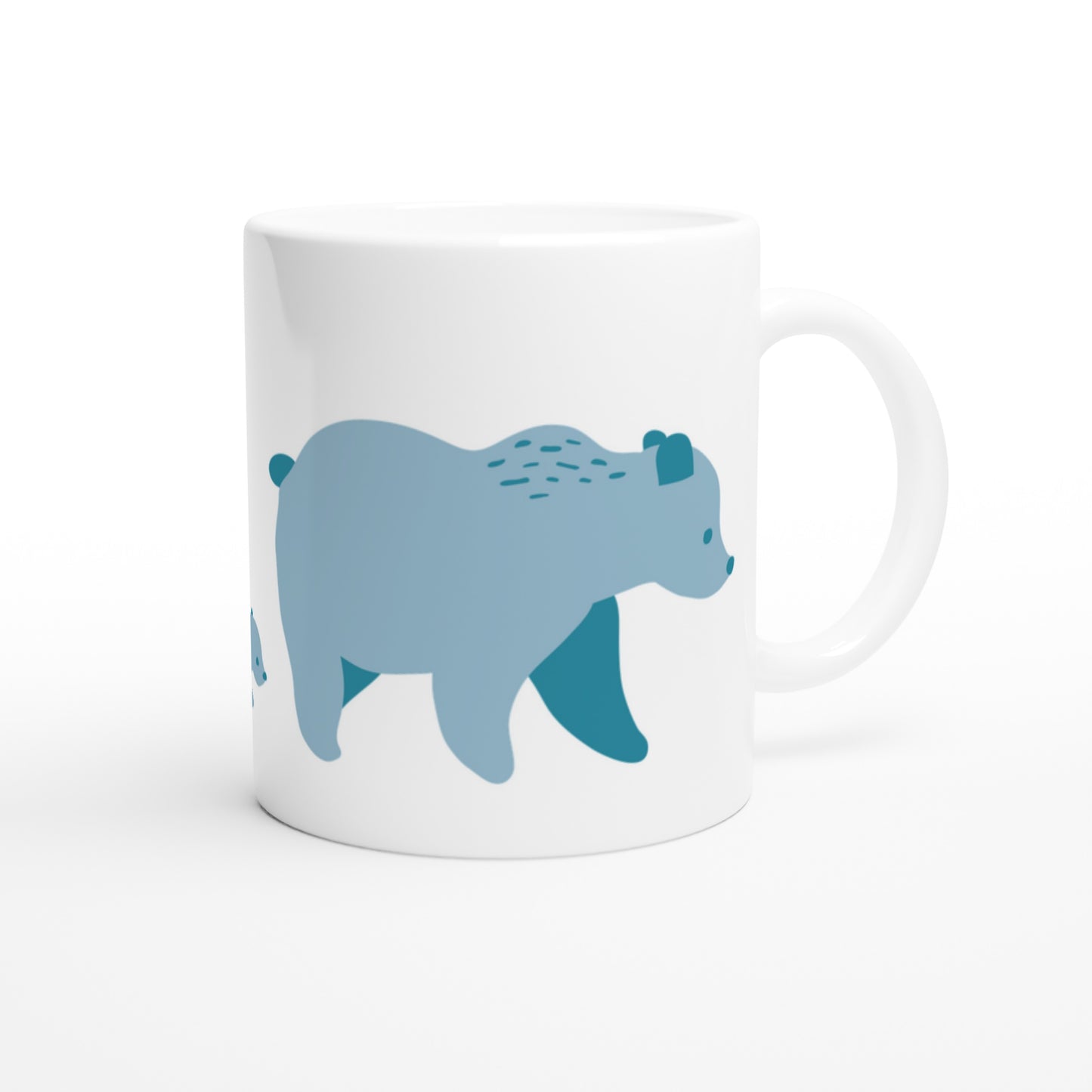 White ceramic mug with a blue bear family print.