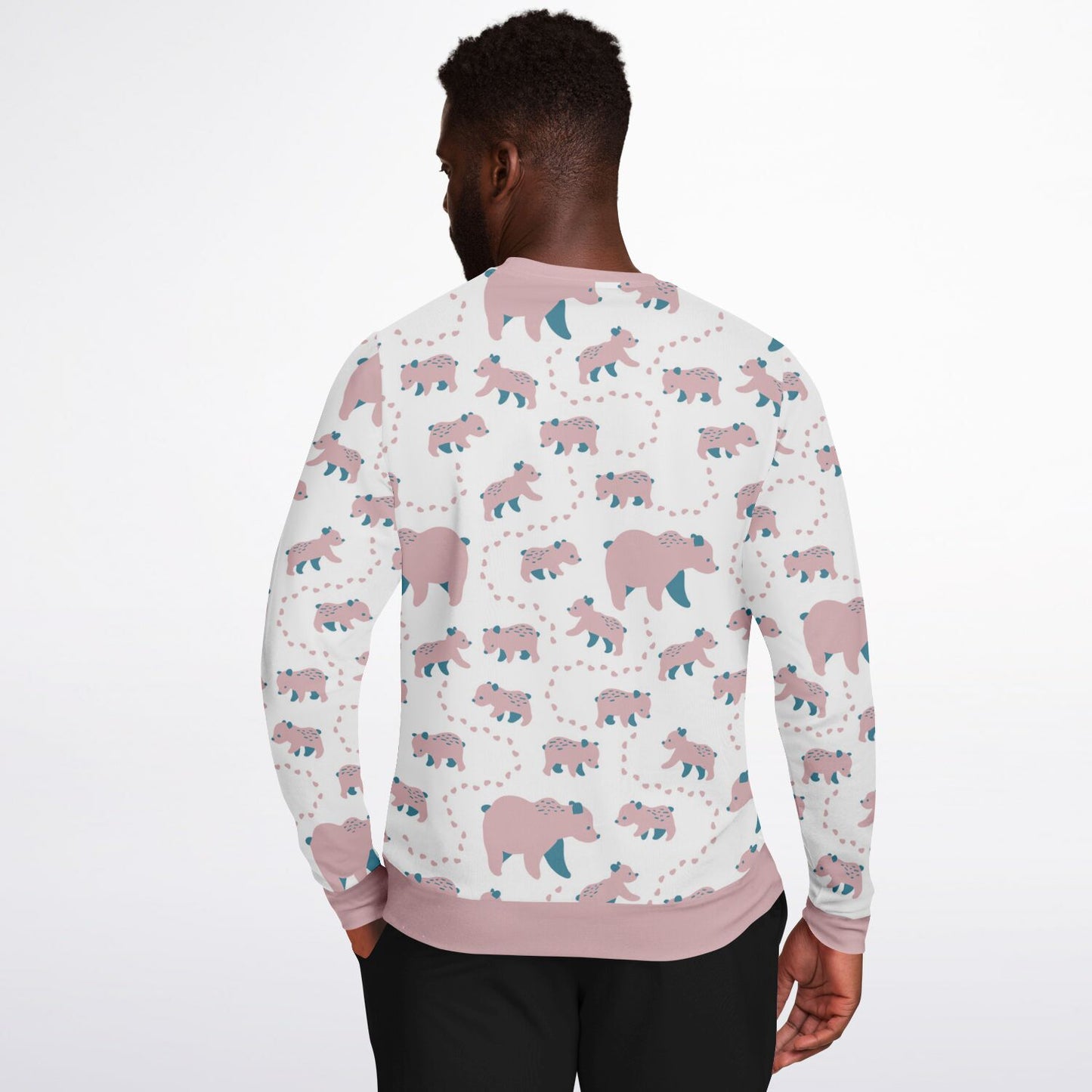 A man wearing a unisex sweatshirt with pink Runaway Cubs -pattern.
