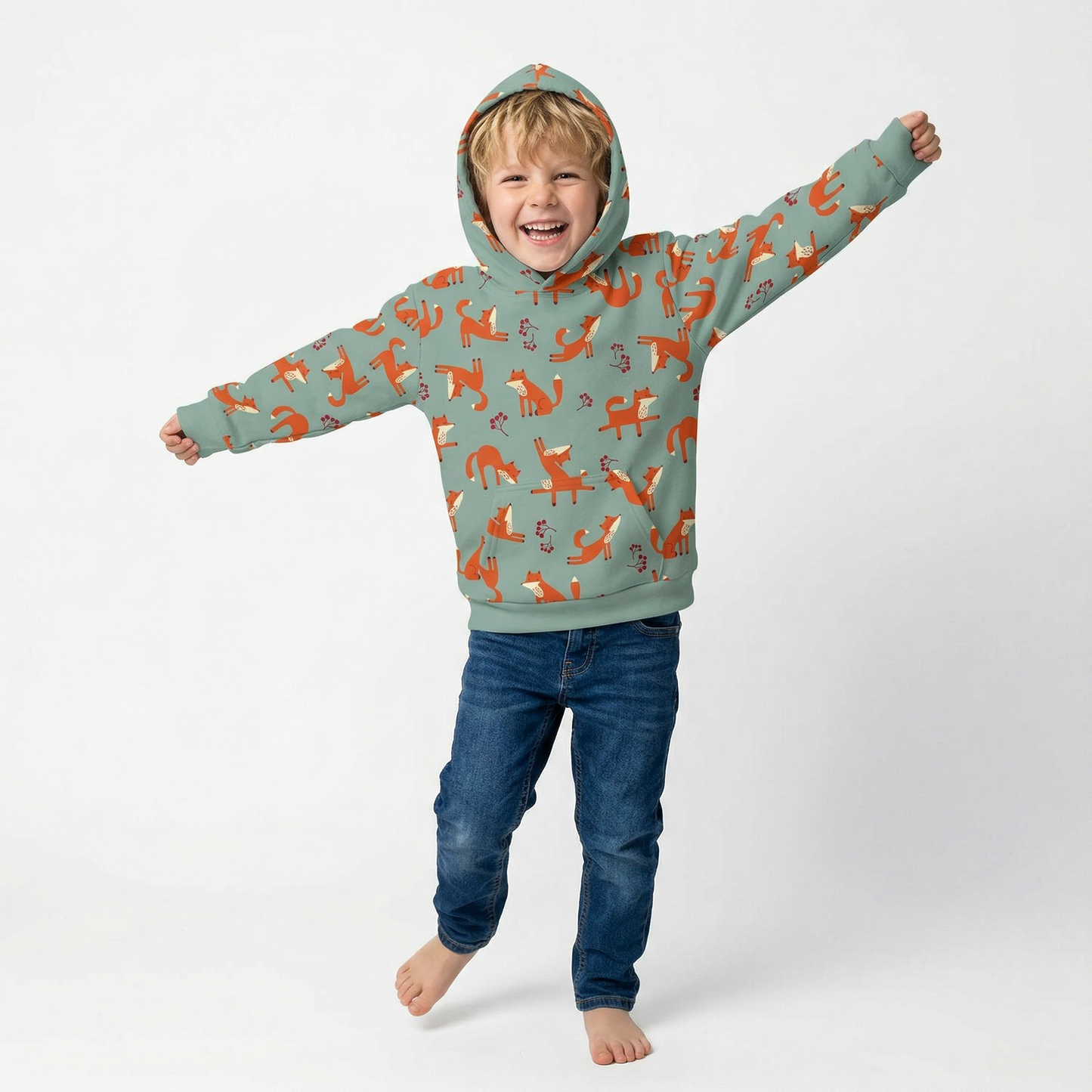 A boy wearing Playful Fox -print hoodie