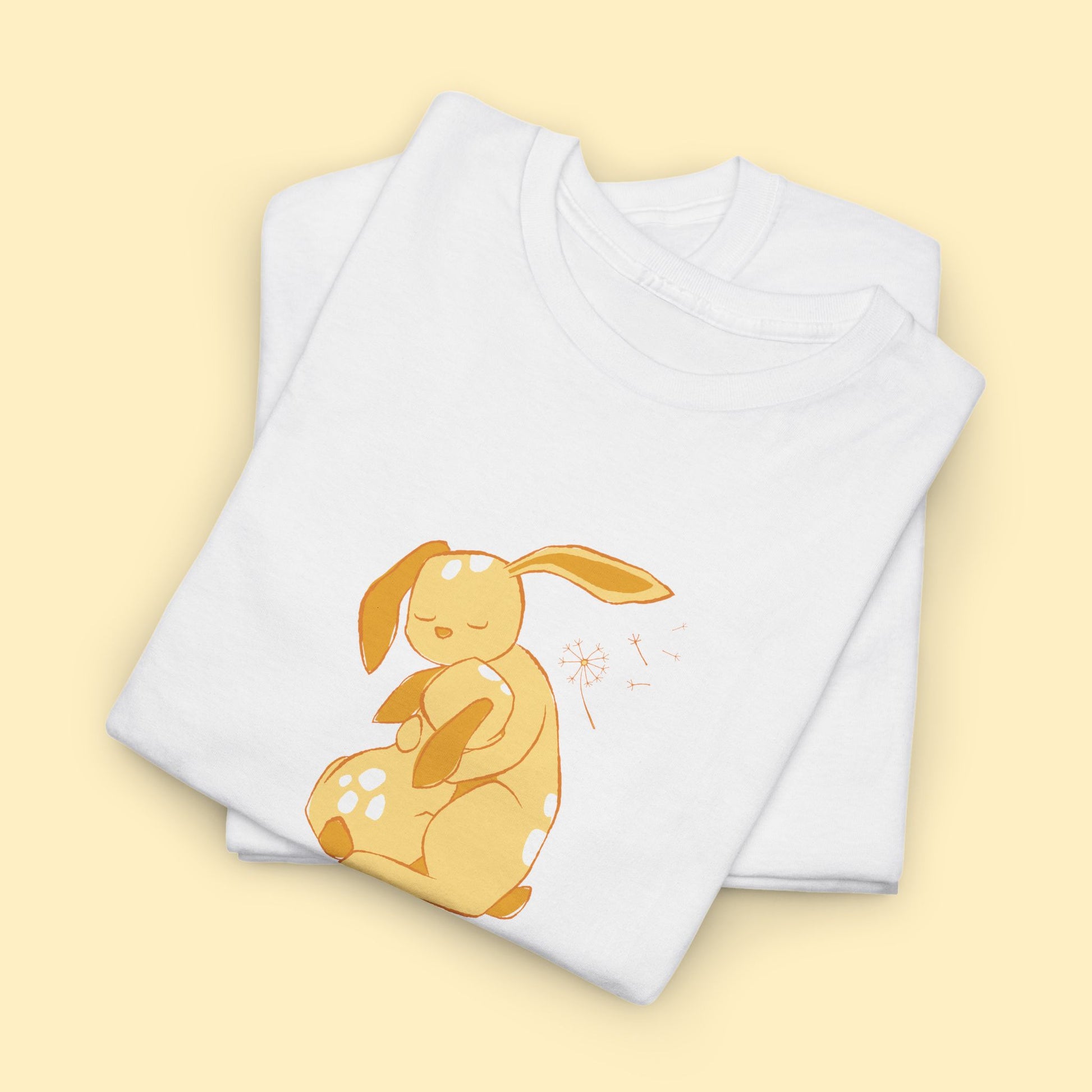 Unisex T-shirt with a print of cuddling hare family