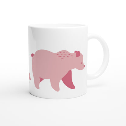 White ceramic mug with a pink bear family print.