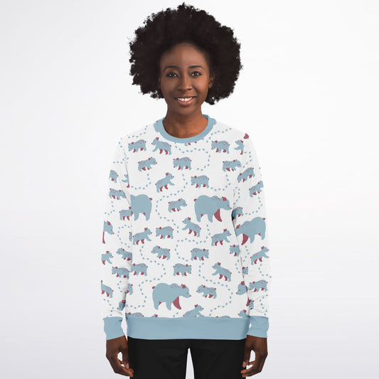 A woman wearing a unisex sweatshirt with blue Runaway Cubs -pattern.