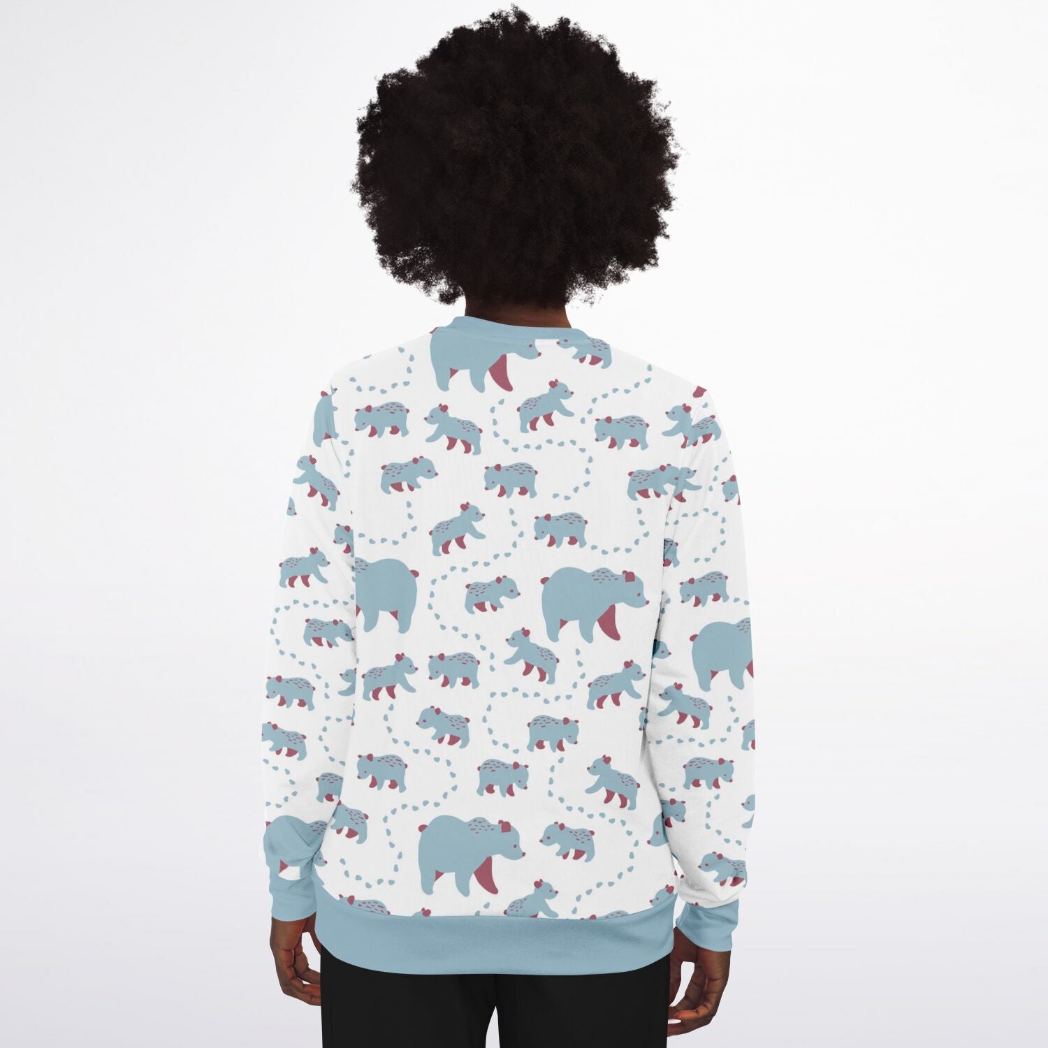 A woman wearing a unisex sweatshirt with blue Runaway Cubs -pattern.