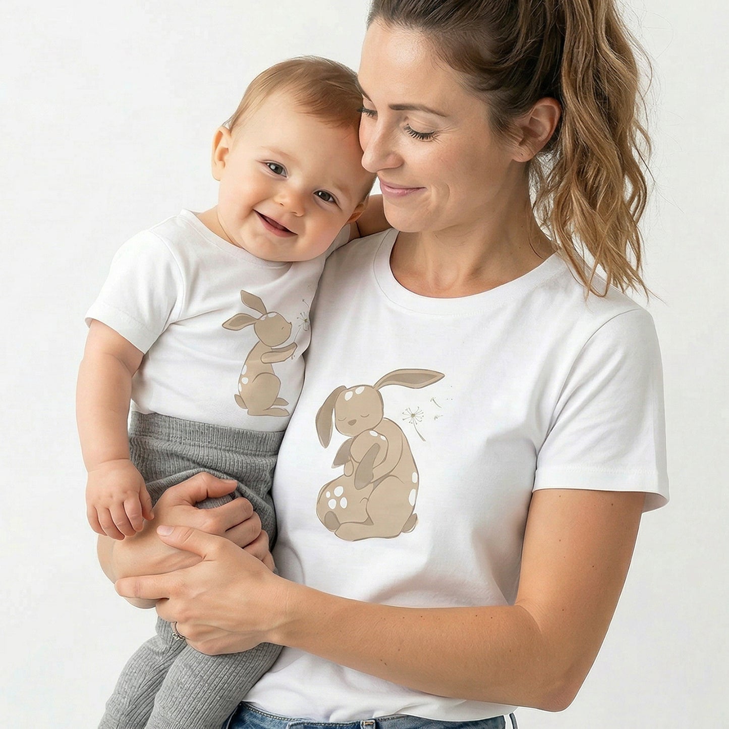 Mother and baby wearing matching Dandelion T-shirts
