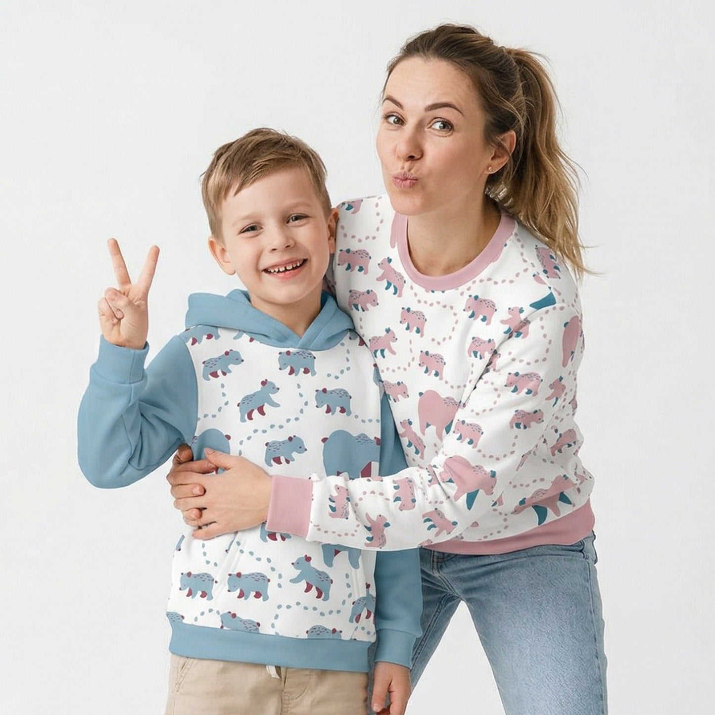 Mother and son wearing matching Bearfam-print clothing